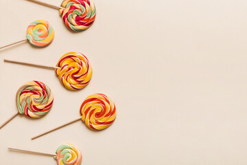 Set of colorful lollipops on colored background. Summer concept. Party Happy Birthday or Minimalist...
