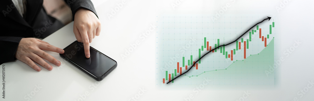 Poster a business professional interacts with a smartphone while analyzing a financial graph that depicts s