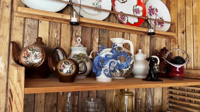 collection of antique dishes, old crockery on the shelves