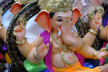 Newly made idols of the God known as Ganesha or Ganapati for sale at a shop on the eve of Ganesh festival in Pune, India.