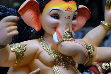Newly made idols of the God known as Ganesha or Ganapati for sale at a shop on the eve of Ganesh festival in Pune, India.