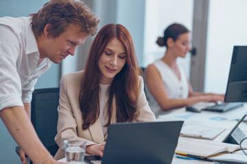 A Collaborative Workspace Featuring Professionals Actively Engaged in Meaningful Discussion