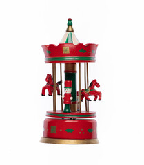vintage wooden toy carousel isolated on white background