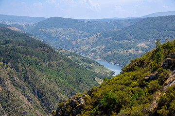 Obraz premium Mountain viewpoint overlooking the Sil River Canyon from Balcones de Madrid and Miradoiro do Curral do Penso, in the scenic Ribeira Sacra region, Ourense, Galicia, Spain.