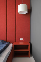 Bedside table near the bed in the bedroom