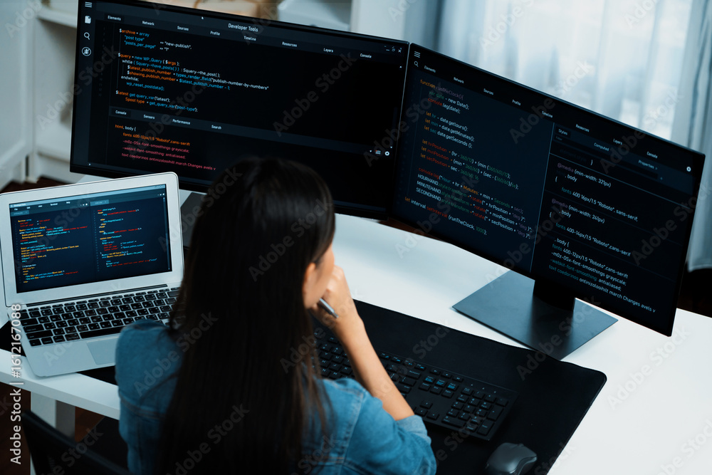 Aufkleber top view young asian it developer creating with typing online information on pc with coding program 