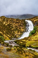 Fototapeta premium Eas a' Bhradain Waterfall, Blackhills Waterfall, Loch Ainort, A87 road, Isle of Skye, Scotland, UK 
