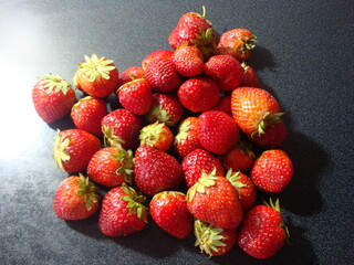 strawberries on a black background
