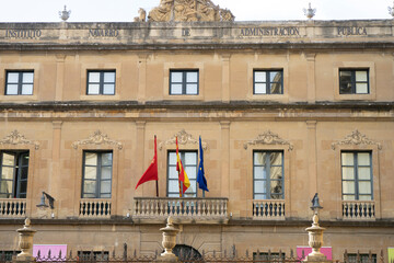 Historic Building in Pamplona, Spain with Flags