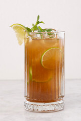 Long island iced tea cocktail. Classic mixed drink. Refreshing long island cocktail with citrus garnish. Chilled long island cocktail. Party favorite drink. Golden classic cocktail.