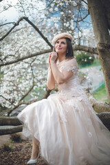 Dreamy Magnolia Garden with Elegant Woman in White Outfit