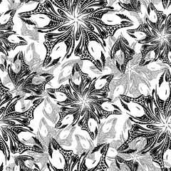 seamless black tracery of a pattern of abstract decorative elements on a gray background, texture, design