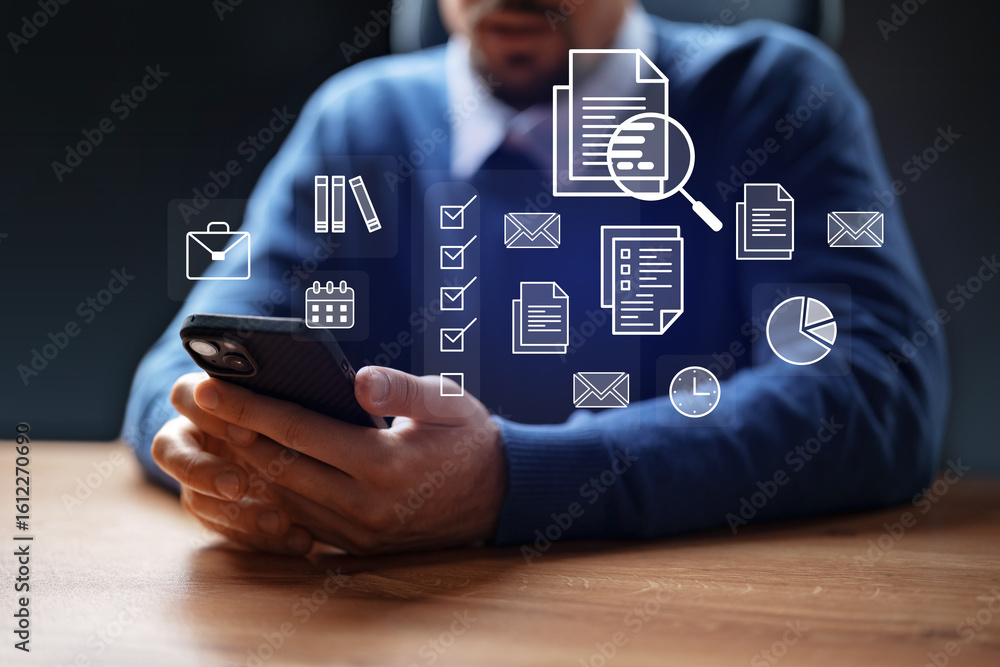 Poster professional man using smartphone to manage tasks and documents in a modern office environment at ev