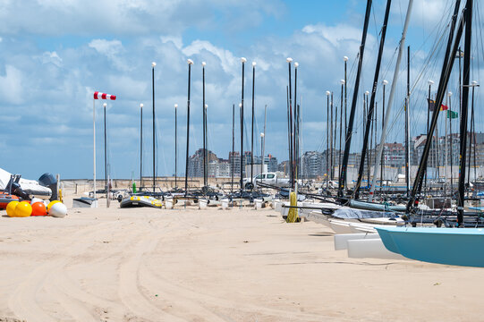Sporty sailing vessels at the sand beach of Knokke Heist, West Flanders, Belgium