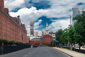 Empty sidewalk and skyline in downtown Baltimore on summer day