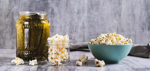 Pickles dill aromatic popcorn in a bowl on the table web banner
