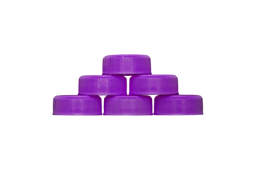 Stack of violet plastic bottle caps is isolated 