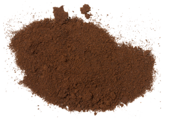 A pile of dark brown finely ground coffee, top view. Coffee is scattered on an isolated background.