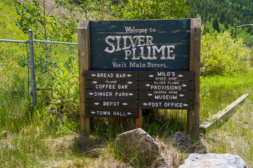 Welcome to Silver Plume Colorado sign, pointing out various tourist attractions