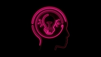 Pink neon lightbulb idea inside head silhouette on black background