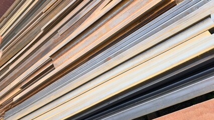 Stacked steel profiles — industrial texture for construction and engineering solutions