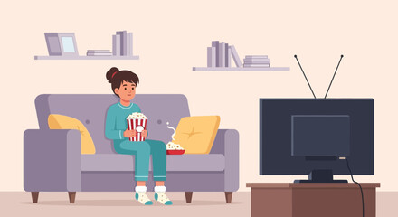 Girl Relaxing on Sofa Watching Television and Eating Popcorn At Home
