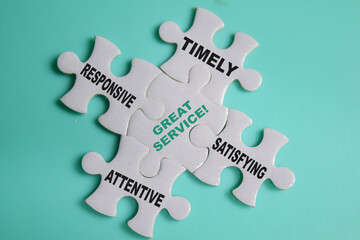 piece of jigsaw puzzle with word great service with keywords. Business and finance concept