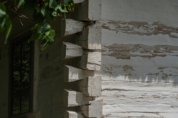 An aged outdoor concrete staircase in an ancient Central European village, under natural, bright daylight. a