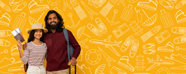 A joyful couple stands ready for their travel adventure, holding tickets and a passport.