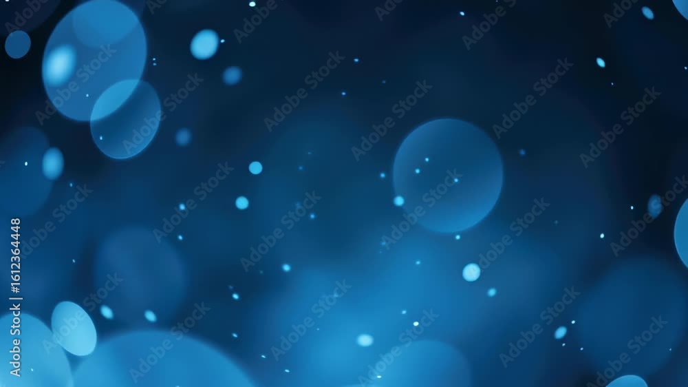 Poster bubbles rise and dance through deep blue water, creating an enchanting visual display of light and m