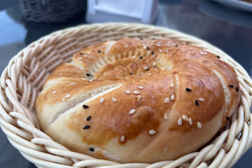 Uzbek round bread. Traditional breakfast tandir bakery, Kazakh tandoor lavash