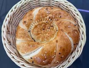 Uzbek round bread. Traditional breakfast tandir bakery, Kazakh tandoor lavash