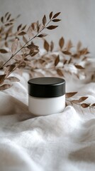 Elegant Cream Jar Mockup with Dried Leaves on Linen Fabric