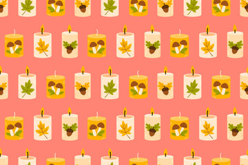 Repeating design with cozy fall candles featuring leaves, mushrooms and berries