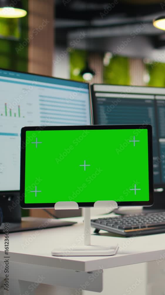 Poster vertical video empty high end workstation with computers and mockup on tablet, showcasing analytics 