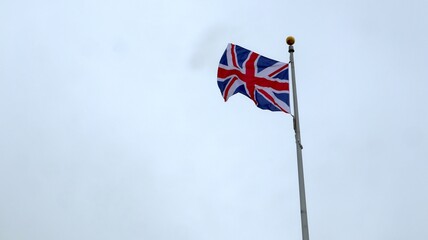 The flag of Great Britain flies over the beaches of Normandy.