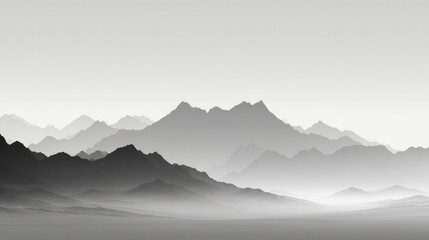 Misty grayscale mountain range