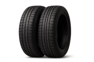 Two new black summer tires standing on transparent background