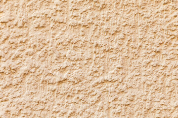 pattern of orange or yellow plaster wall