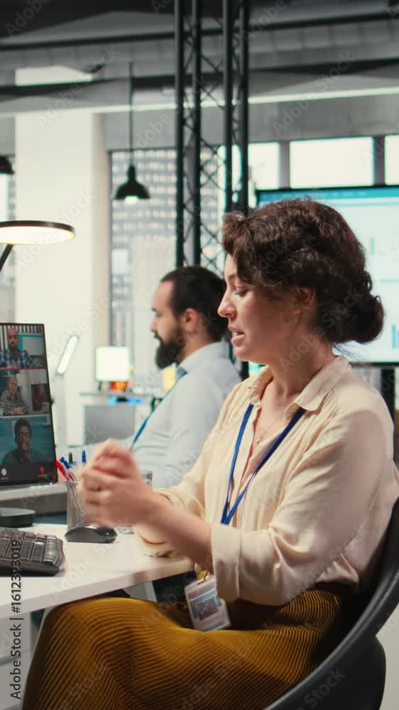 Aufkleber vertical video woman engaging in discussion on video call to share finance strategy details, using d