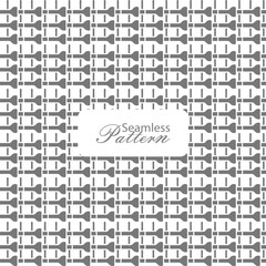 Seamless pattern of gray key and wrench silhouettes on white background