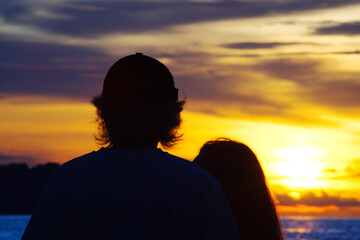 Backshot of silhouette of people during sunset