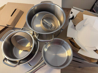 New Kitchen Essentials. Freshly Unboxed Stainless Steel Pots and Pans, Cookware Set