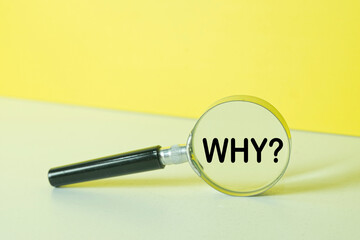 Magnifying glass over the question WHY? over yellow background.,Concept for root cause analysis...