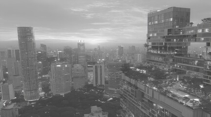 Modern City Skyline with Tall Skyscrapers and Urban Architecture During Sunset