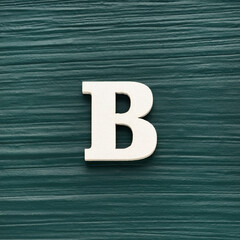 Capital letter B, White letter on a rustic dark green background
