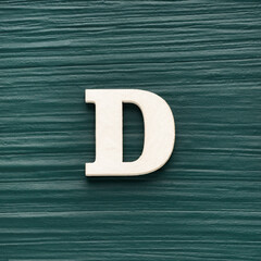 Capital letter D, White letter on a rustic dark green background