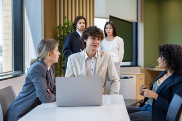Team of diversity business people are discussing over new strategic strategy project on investment real estate while working in modern office building for new project and planning