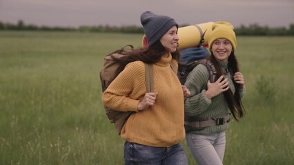 happy female traveler vacation sports hiking with tourist backpacks, dreaming of a fun vacation,...