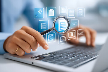 Work With Digital Documents and Efficient Data Management Using a Magnifying Glass and Laptop